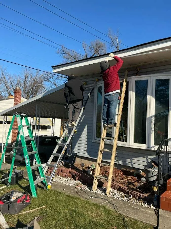 Restoration crew performing exterior repair in Waverly